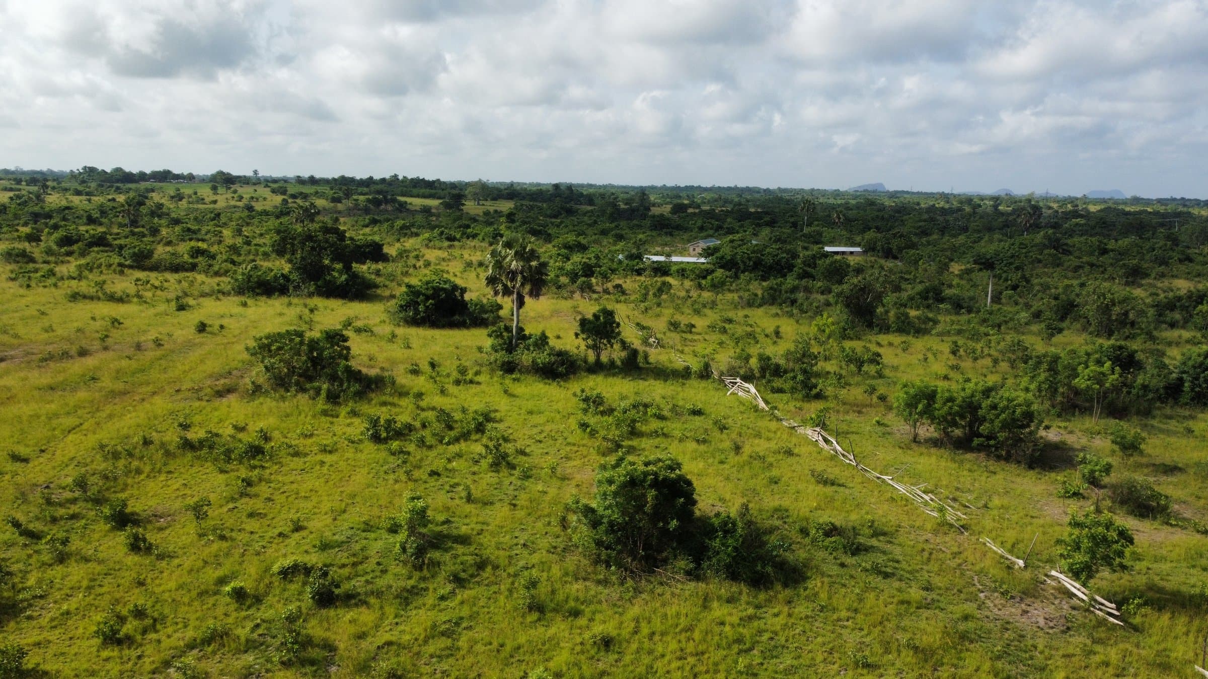 Aerial drone photo of the green hills and countryside surrounding Adaklu