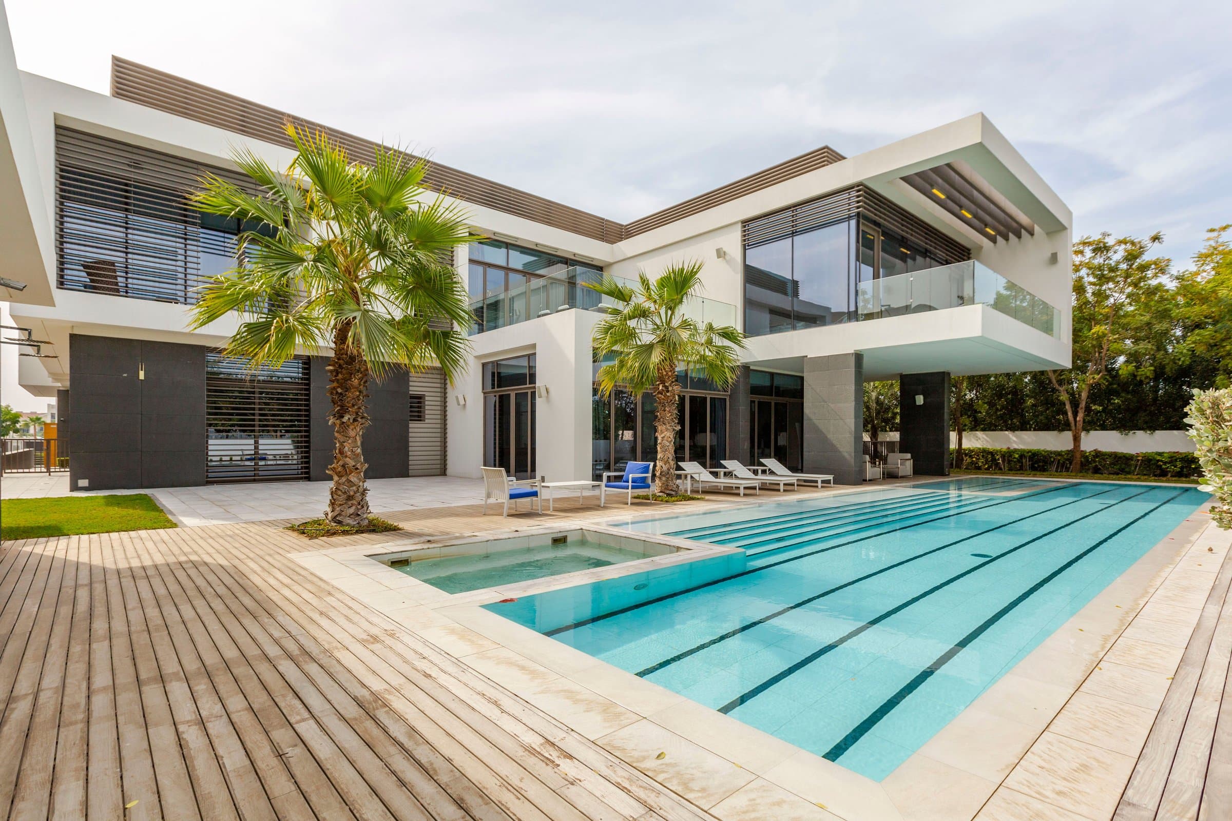 A modern Ubuntu Eco Gardens villa concept with a private pool and palm trees